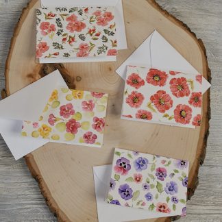 set of four mini cards and envelopes with a watercolor botanical design