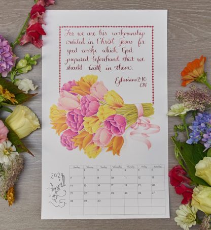 bouquet of brightly colored tulips with bible verse