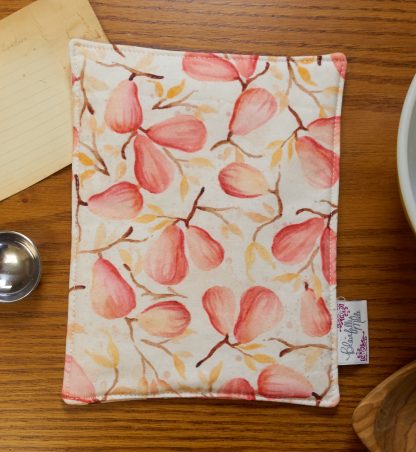 pot holder with watercolor pears on it