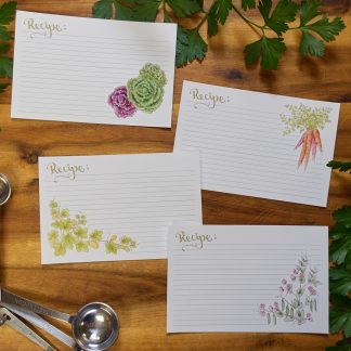 four recipe cards with vegetables on them