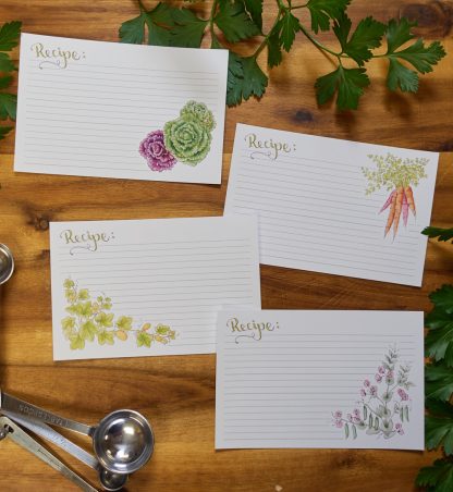 four recipe cards with vegetables on them