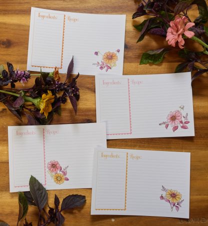 four recipe cards with zinnia flowers on them