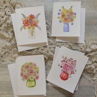 four cards featuring pen and ink dahlia bouquets