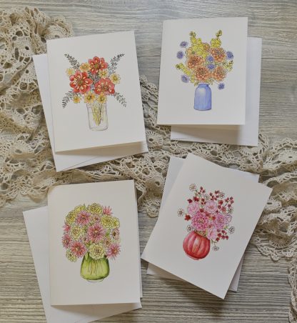 four cards featuring pen and ink dahlia bouquets