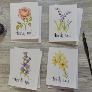 four note cards with pen and ink flowers that say thank you